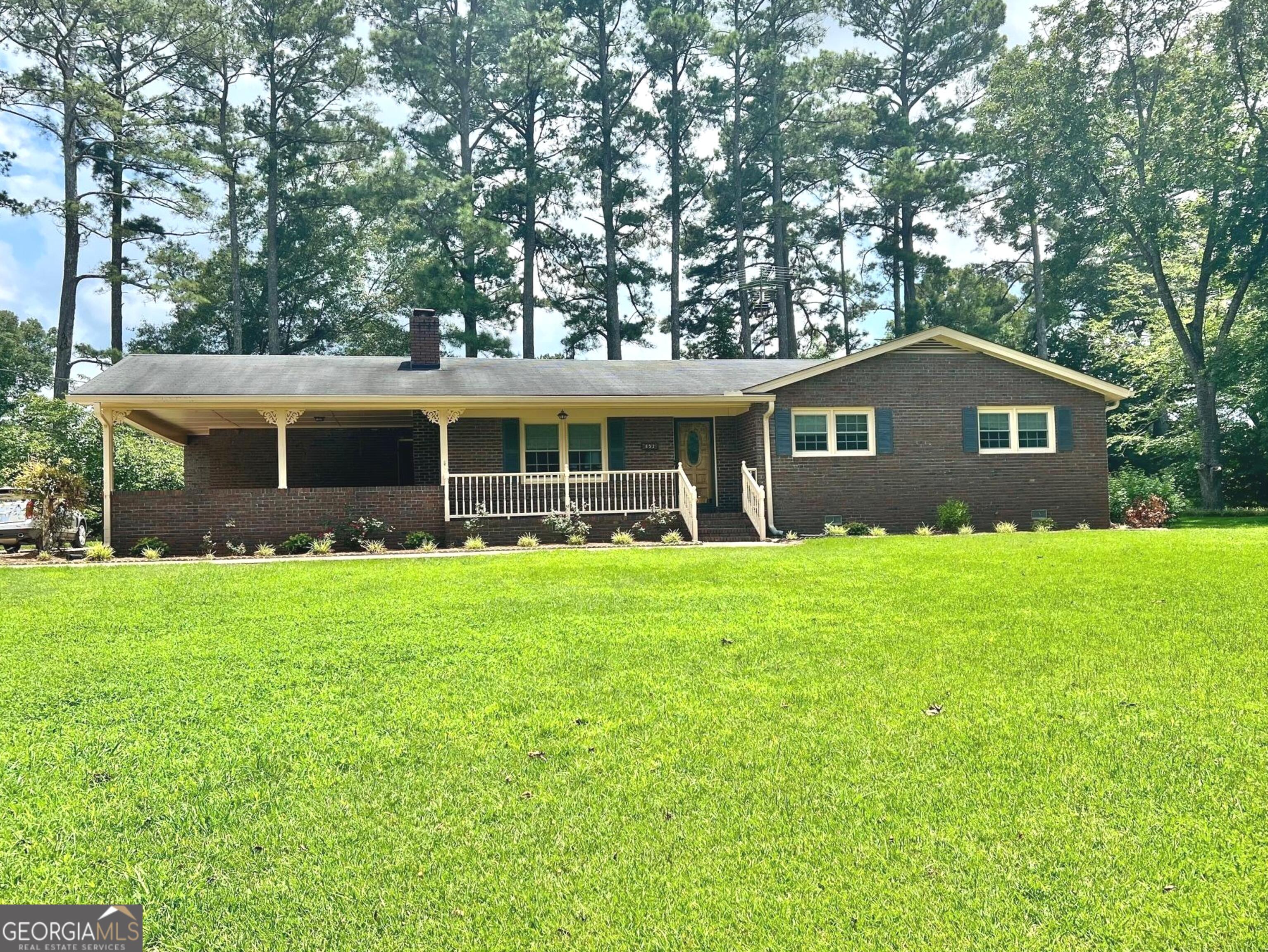 852 Greenvale Road Thomaston, GA 30286 - Photo 1 of 1 a view of a house with a backyard