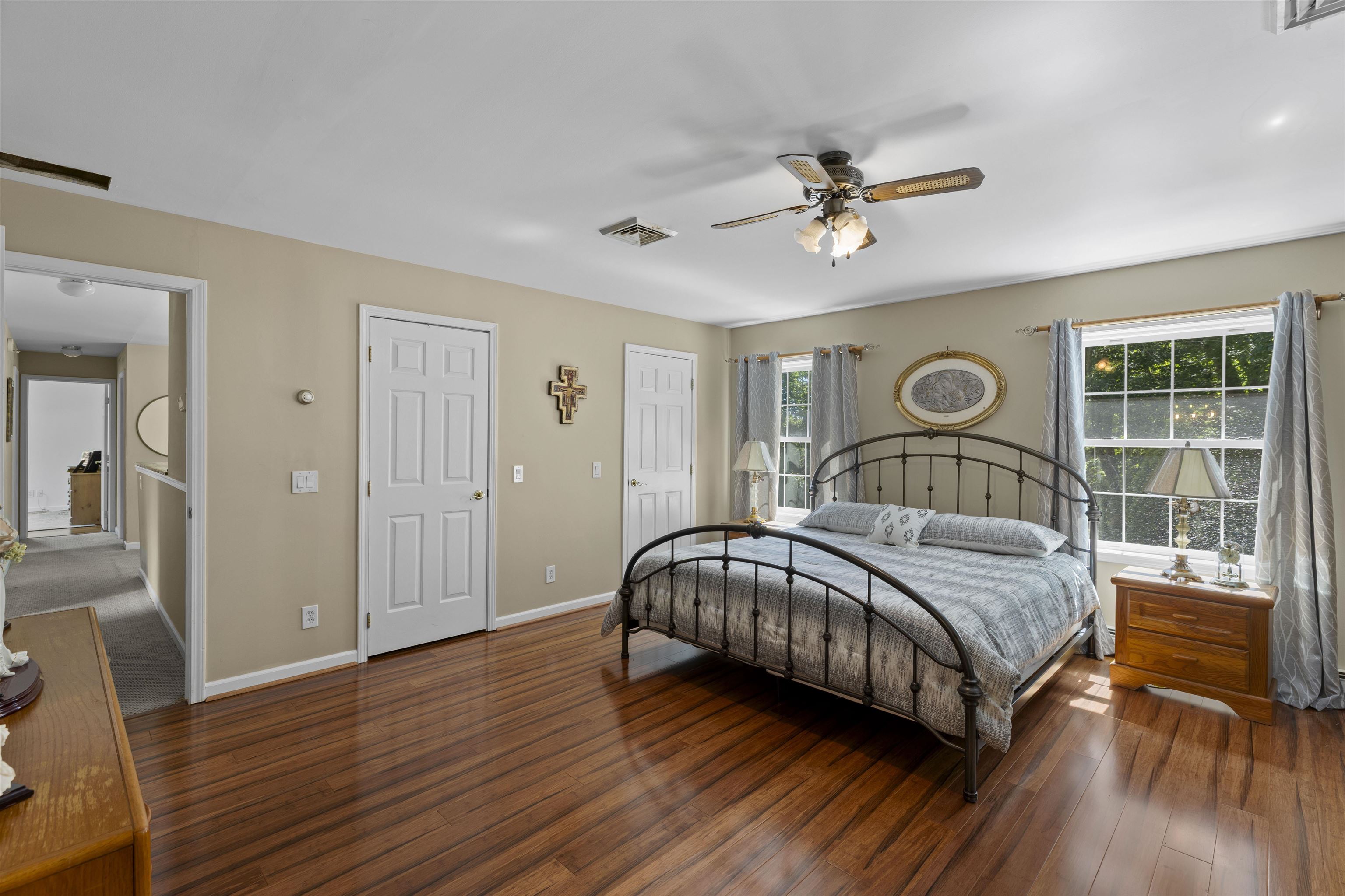 551 Shunpike Road Cape May Court House, NJ 08210 - Photo 16 of 47 a bedroom with a bed and wooden floor