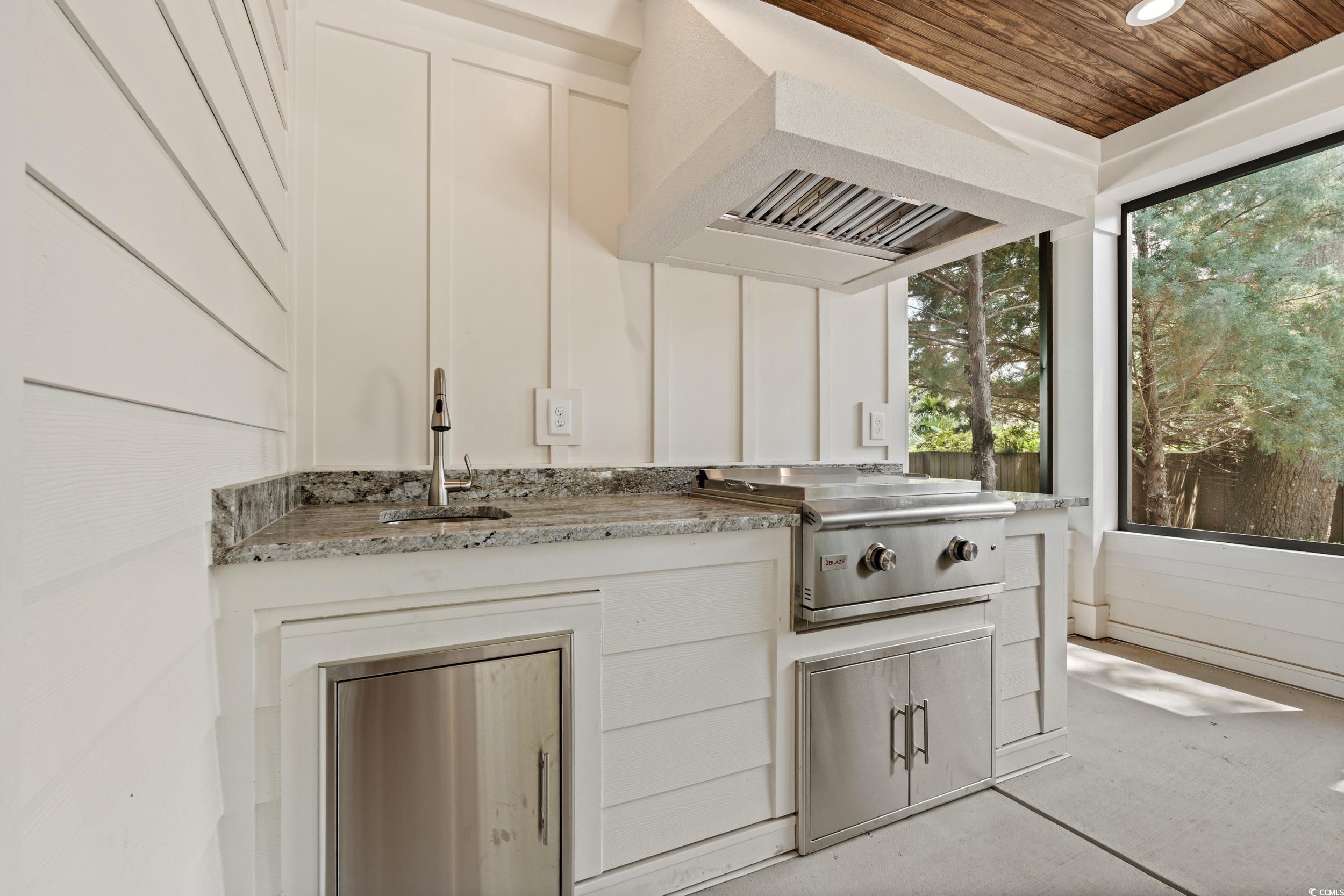405 North Highland Way Myrtle Beach, SC 29572 - Photo 16 of 40 View of patio / terrace featuring a sink, grilling area, and exterior kitchen