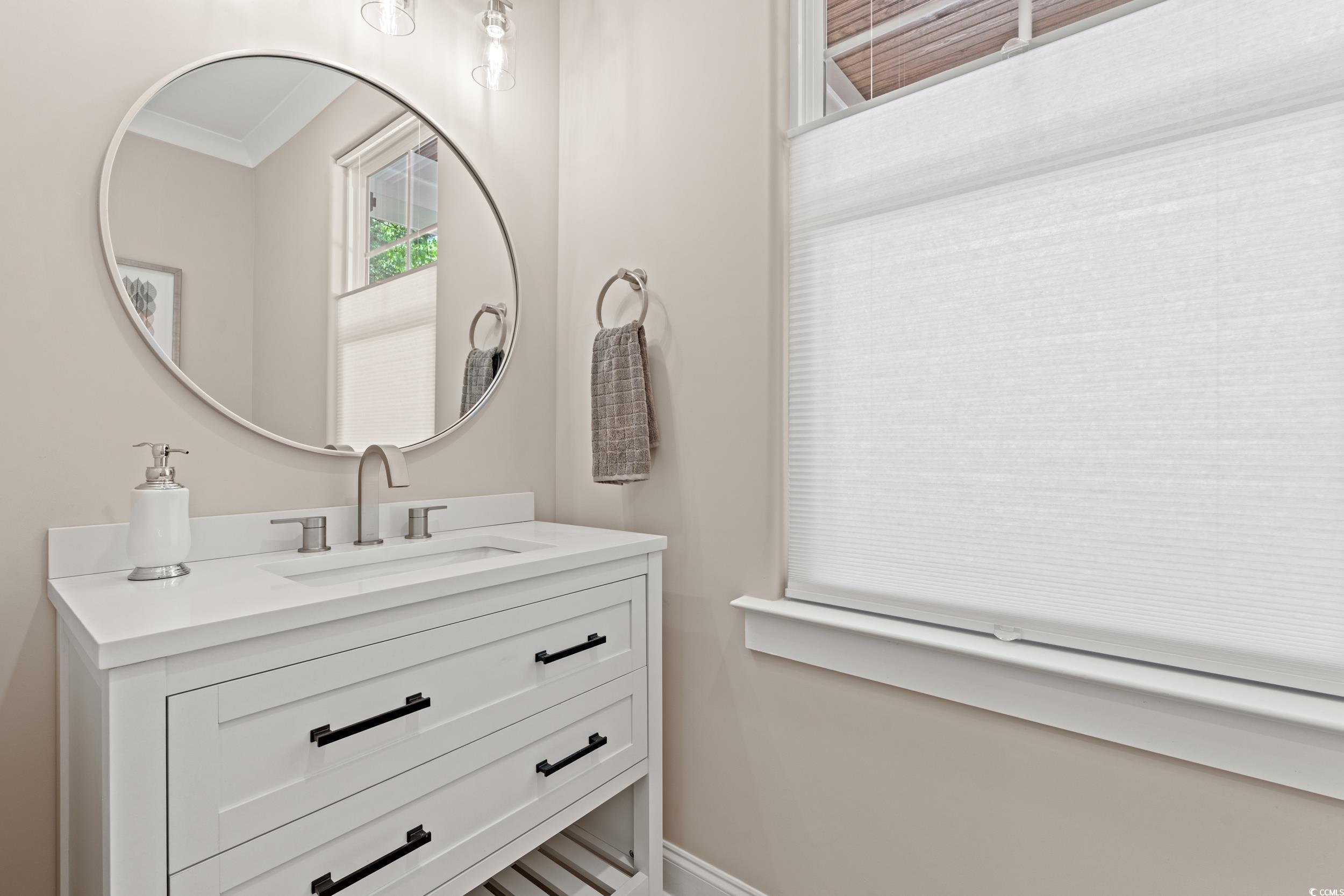 405 North Highland Way Myrtle Beach, SC 29572 - Photo 27 of 40 Bathroom with vanity and baseboards