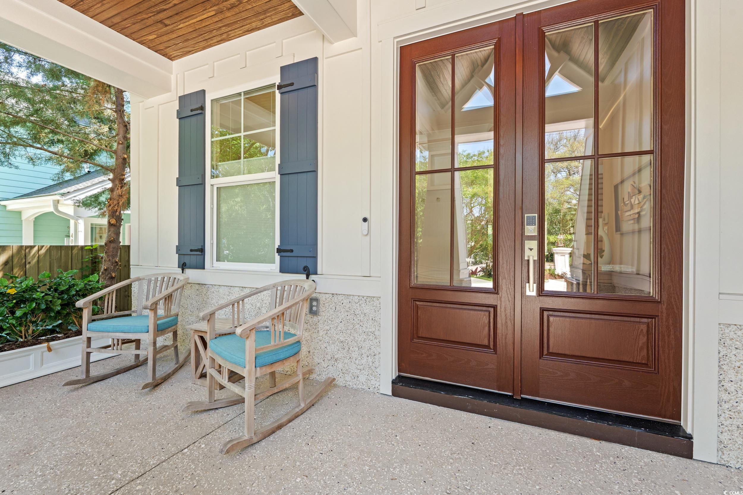405 North Highland Way Myrtle Beach, SC 29572 - Photo 4 of 40 Property entrance featuring a porch and french doors
