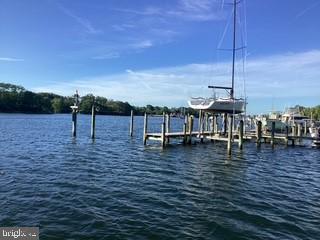 508 Summerset Court, Unit 33 Solomons, MD 20629 - Photo 36 of 36 a view of a lake with a floor to ceiling window