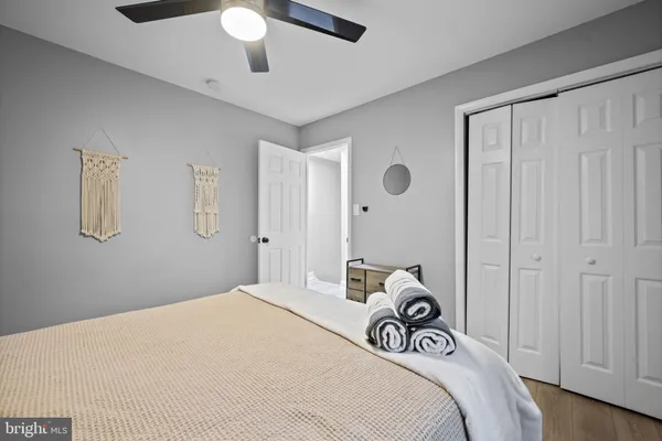 a bathroom with a toilet sink and shower