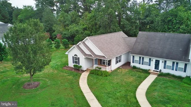 a backyard of a house with seating space