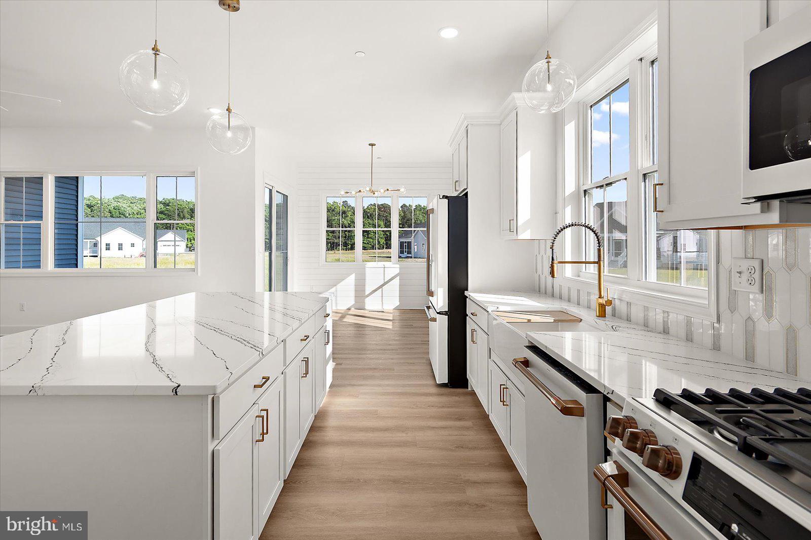 75 King Richard Road Berlin, MD 21811 - Photo 16 of 107 Kitchen with high end Cafe appliances