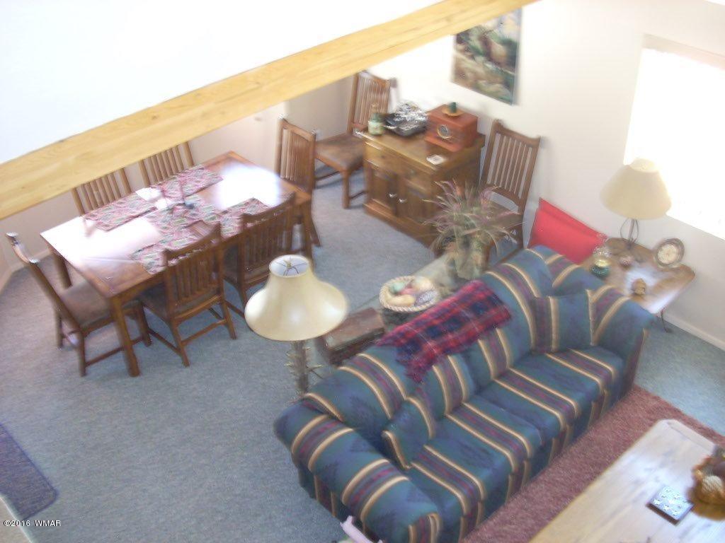 2101 Chevelon Road Overgaard, AZ 85933 - Photo 19 of 45 a living room with furniture