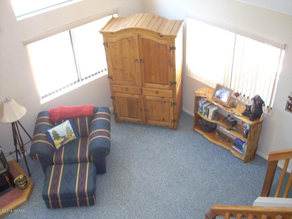 2101 Chevelon Road Overgaard, AZ 85933 - Photo 21 of 45 a living room with furniture