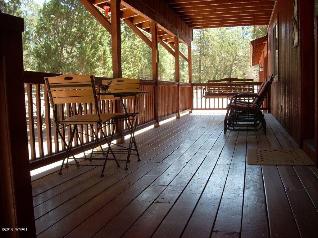 2101 Chevelon Road Overgaard, AZ 85933 - Photo 6 of 45 a view of outdoor seating space with wooden floor