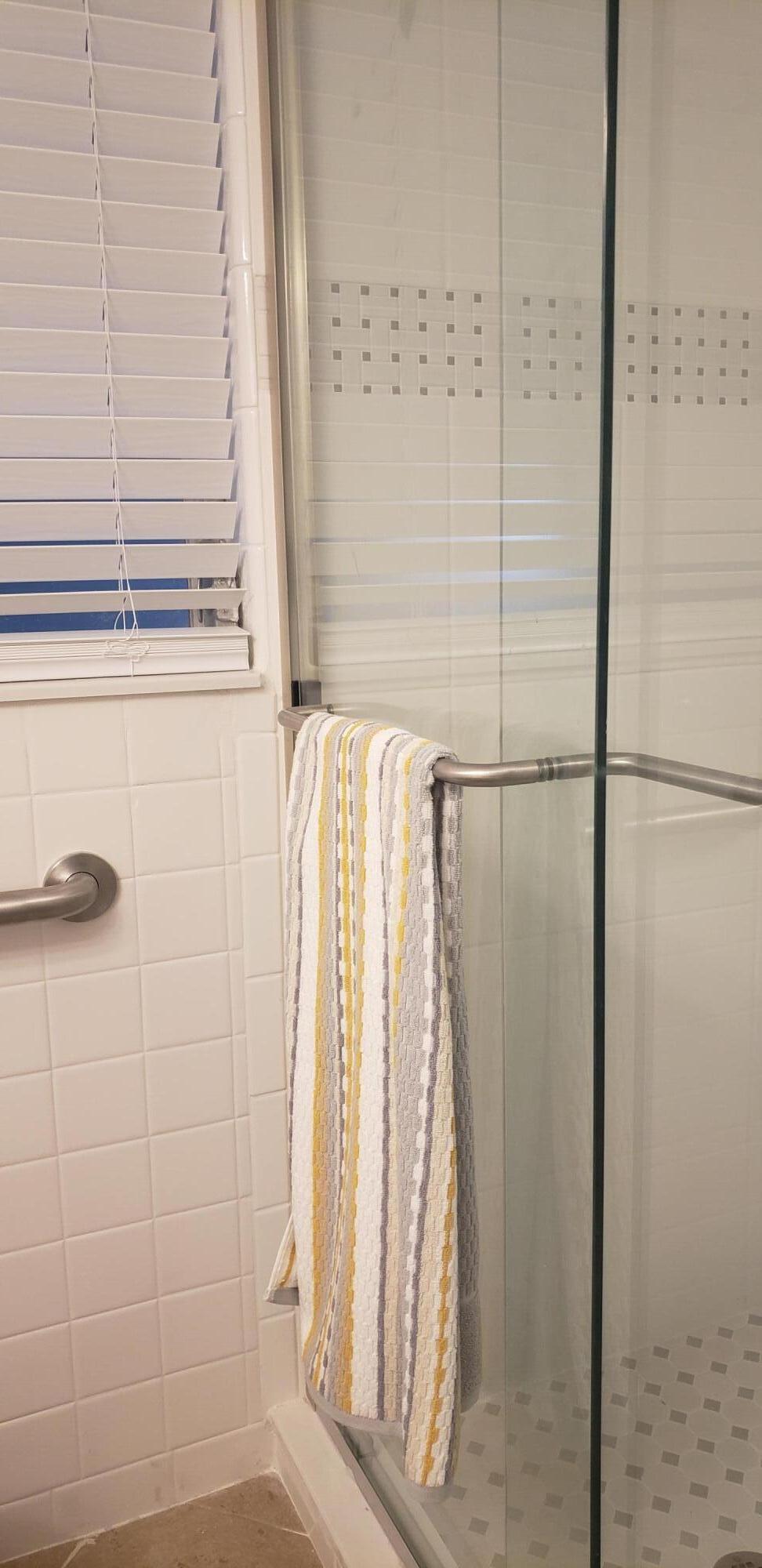 4107 Southeast Barcelona Street Stuart, FL 34997 - Photo 4 of 19 a bathroom with a shower