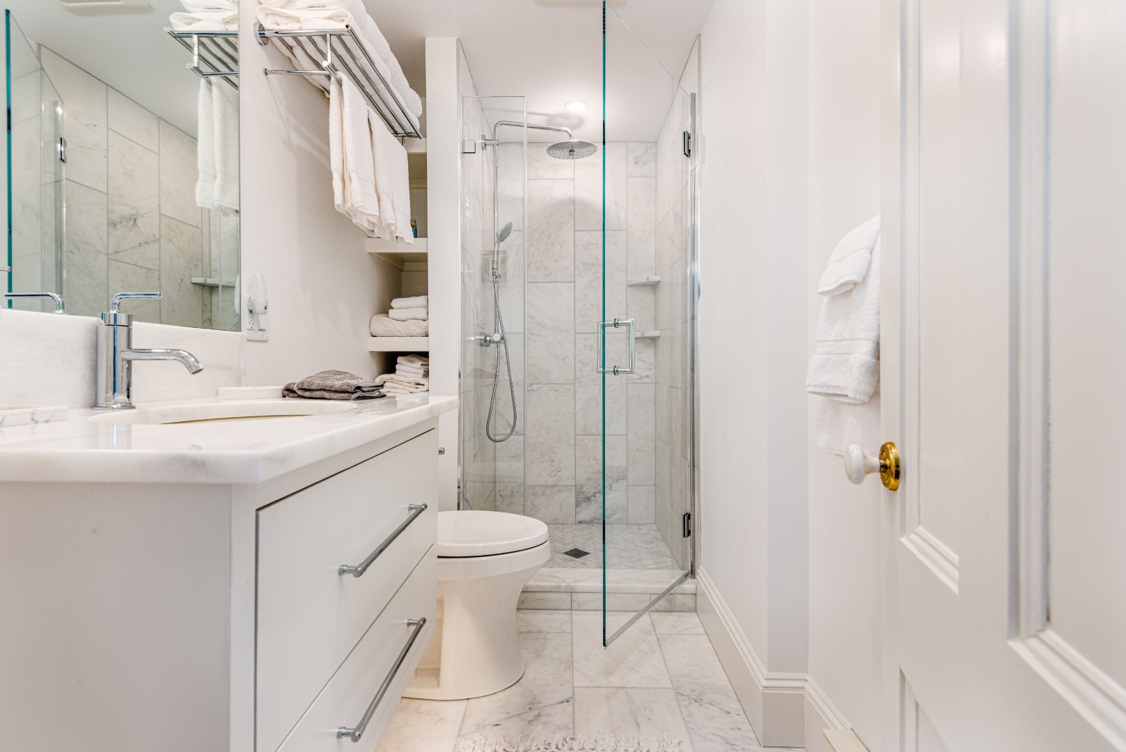 8 D Cliff Road, Unit 4D Nantucket, MA 02554 - Photo 15 of 18 a bathroom with a sink toilet and shower