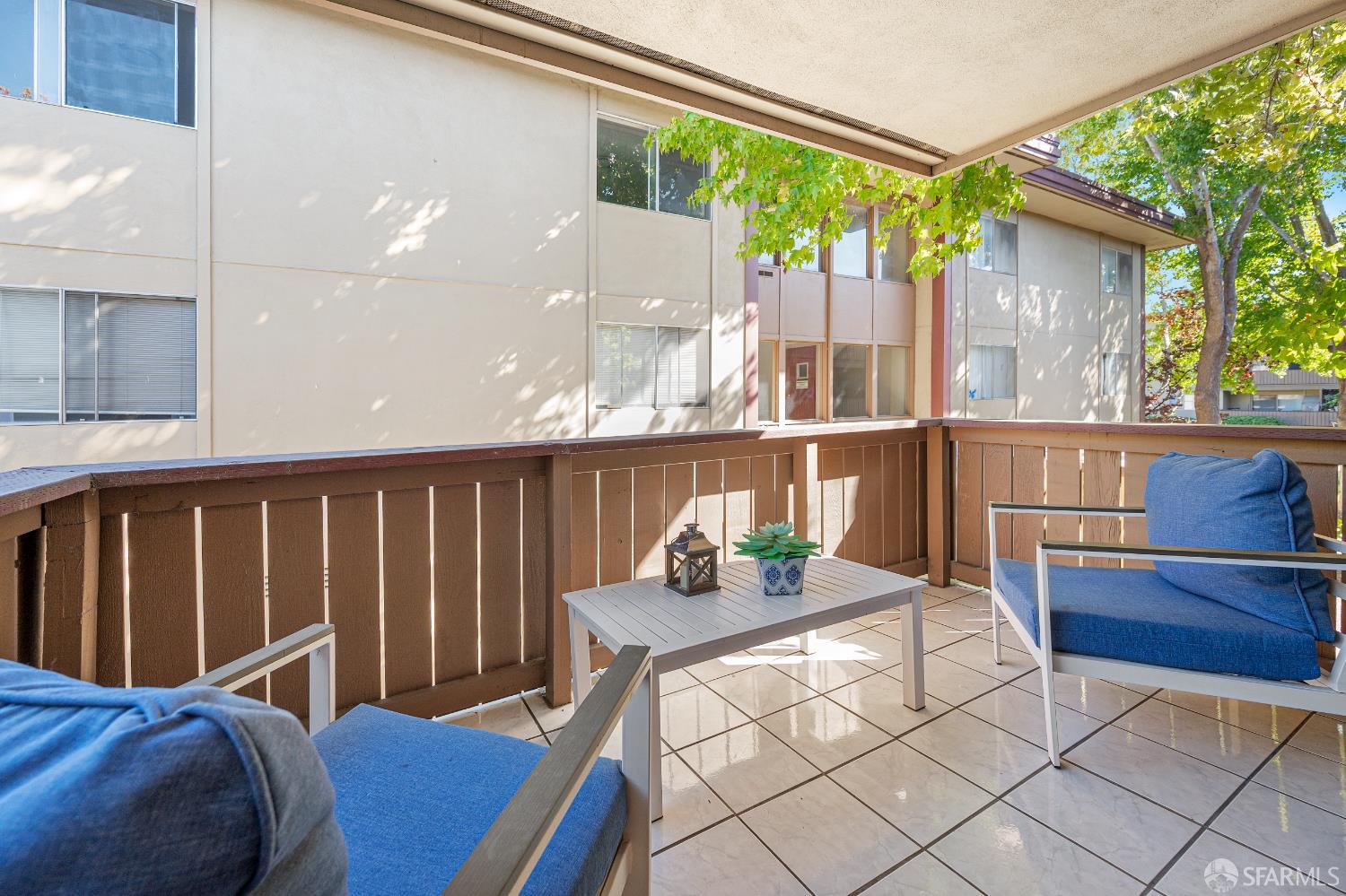 1327 Webster Street, Unit B210 Alameda, CA 94501 - Photo 17 of 55 a view of a dining room with furniture and a window