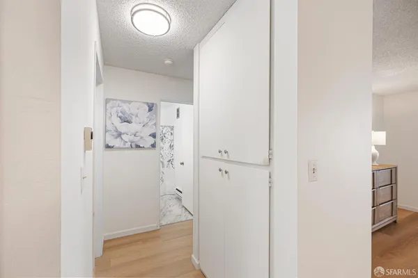 a view of bathroom with wooden floor