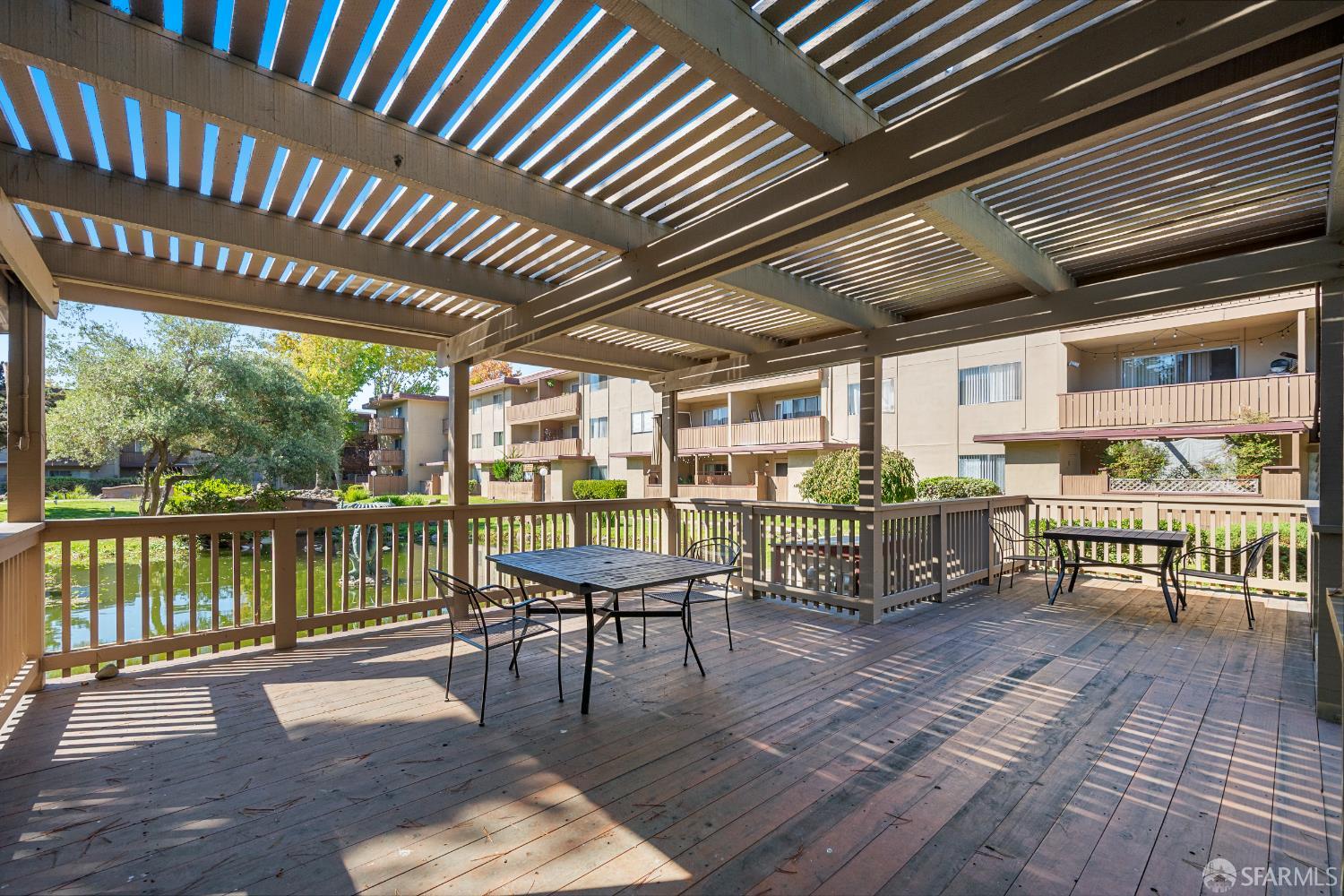 1327 Webster Street, Unit B210 Alameda, CA 94501 - Photo 29 of 55 a view of a chairs and table in the roof deck