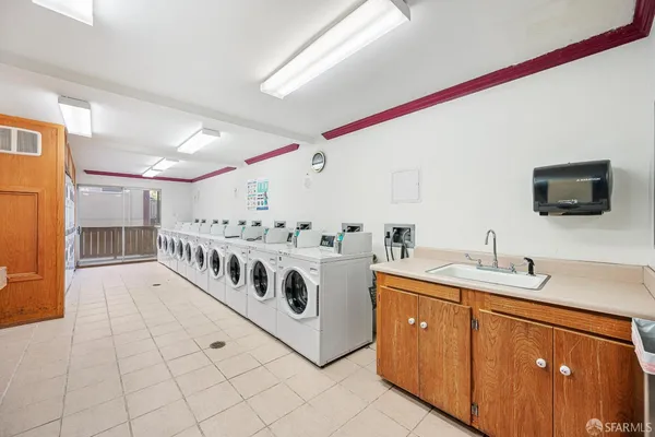 a view of a hardwood floor and a sink