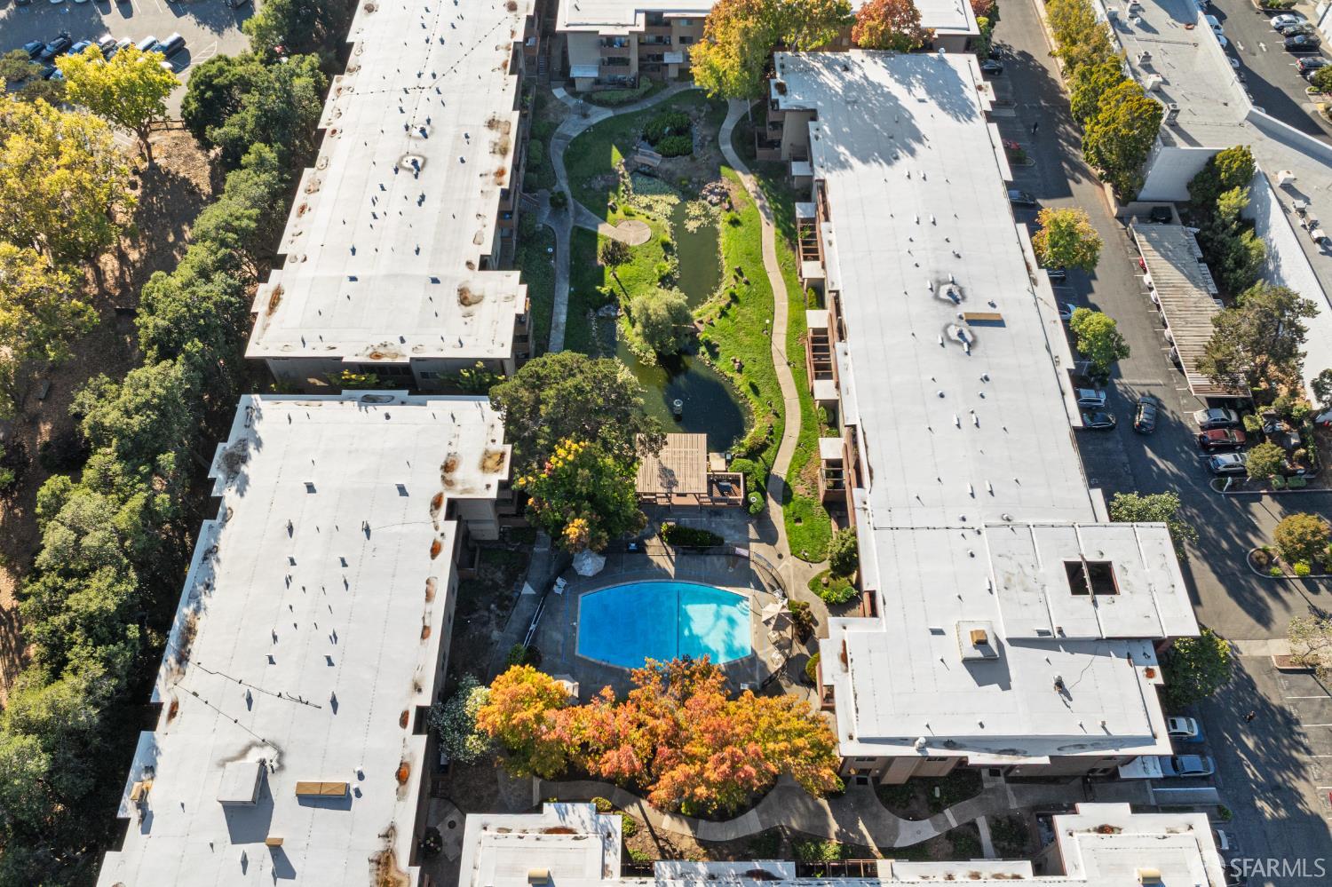 1327 Webster Street, Unit B210 Alameda, CA 94501 - Photo 53 of 55 an aerial view of a residential apartment building with yard