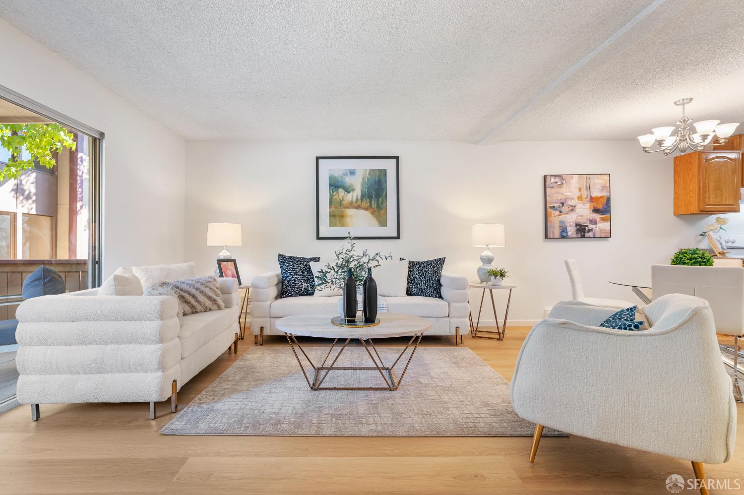 1327 Webster Street, Unit B210 Alameda, CA 94501 - Photo 6 of 55 a living room with furniture and a painting on the wall