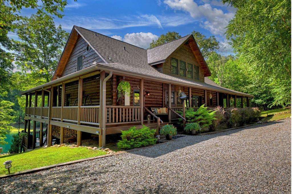505 Old Salem Road Mineral Bluff, GA 30559 - Photo 33 of 88 a front view of a house with garden