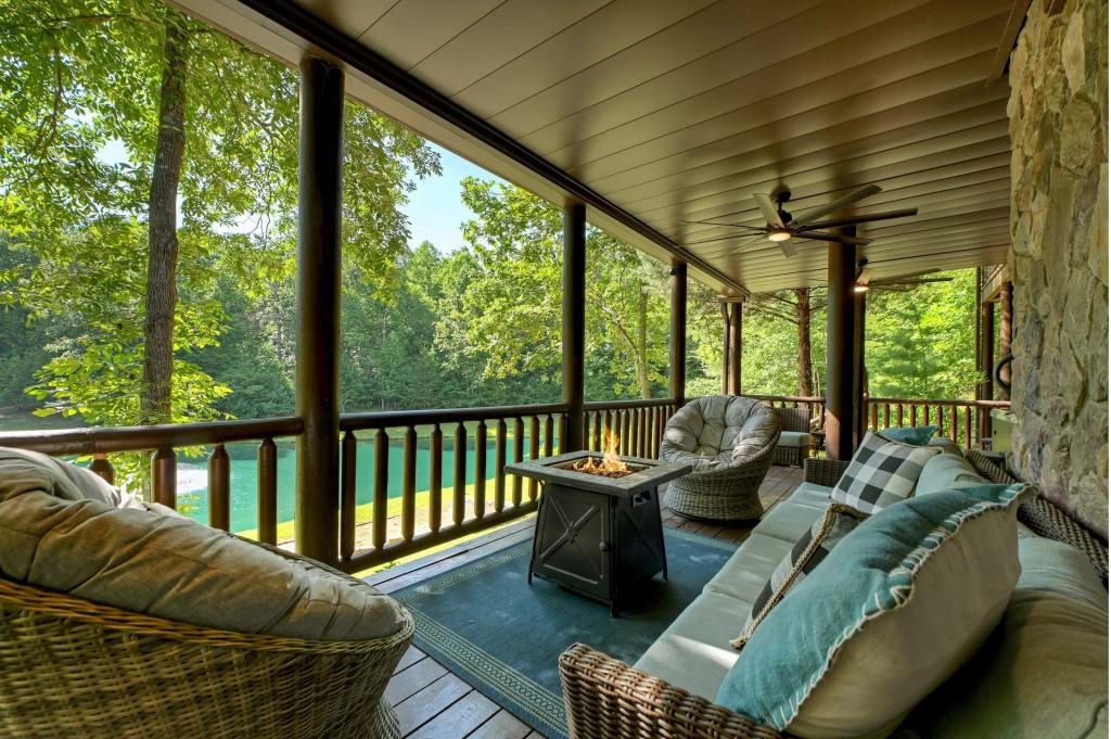 505 Old Salem Road Mineral Bluff, GA 30559 - Photo 48 of 88 a balcony with furniture and a garden