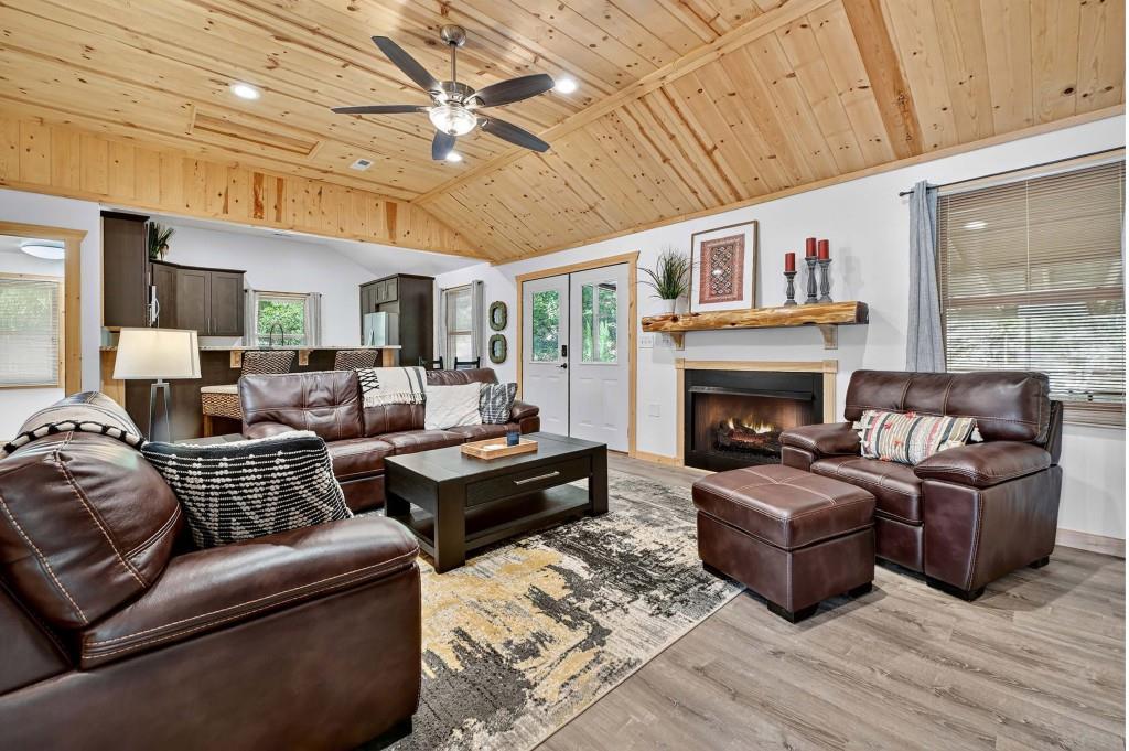 505 Old Salem Road Mineral Bluff, GA 30559 - Photo 56 of 88 a living room with furniture a fireplace and a flat screen tv