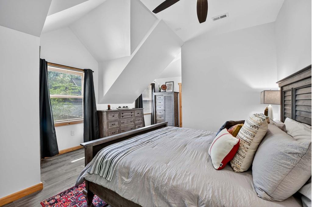 505 Old Salem Road Mineral Bluff, GA 30559 - Photo 64 of 88 a bedroom with a bed and a large window