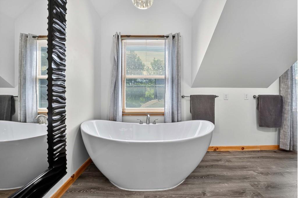 505 Old Salem Road Mineral Bluff, GA 30559 - Photo 65 of 88 a white tub sitting next to a window