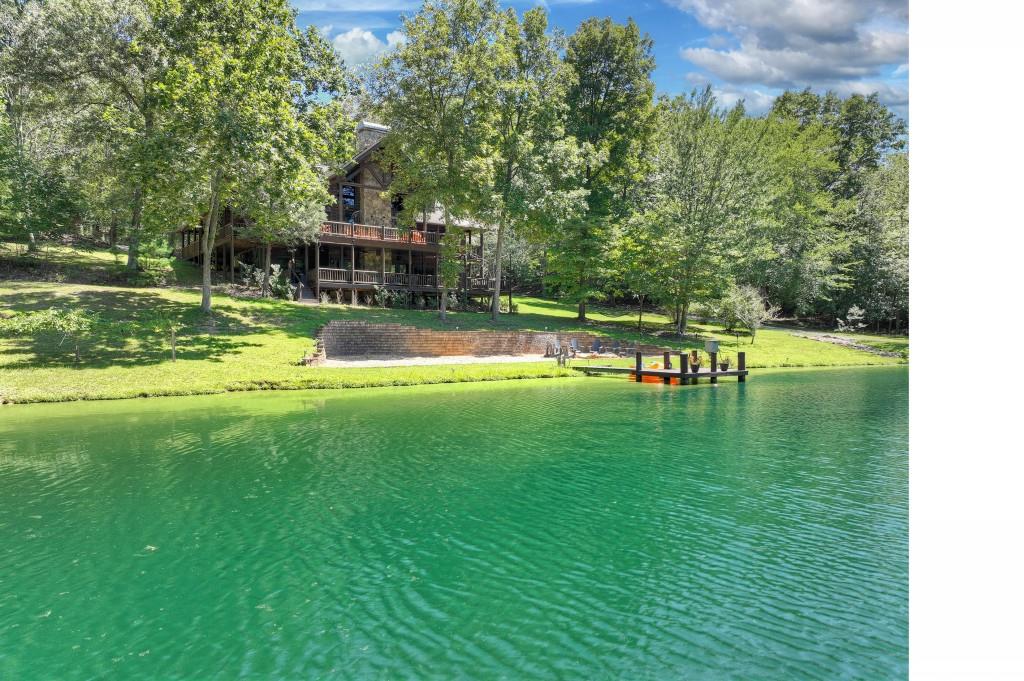 505 Old Salem Road Mineral Bluff, GA 30559 - Photo 71 of 88 a view of a swimming pool with a yard