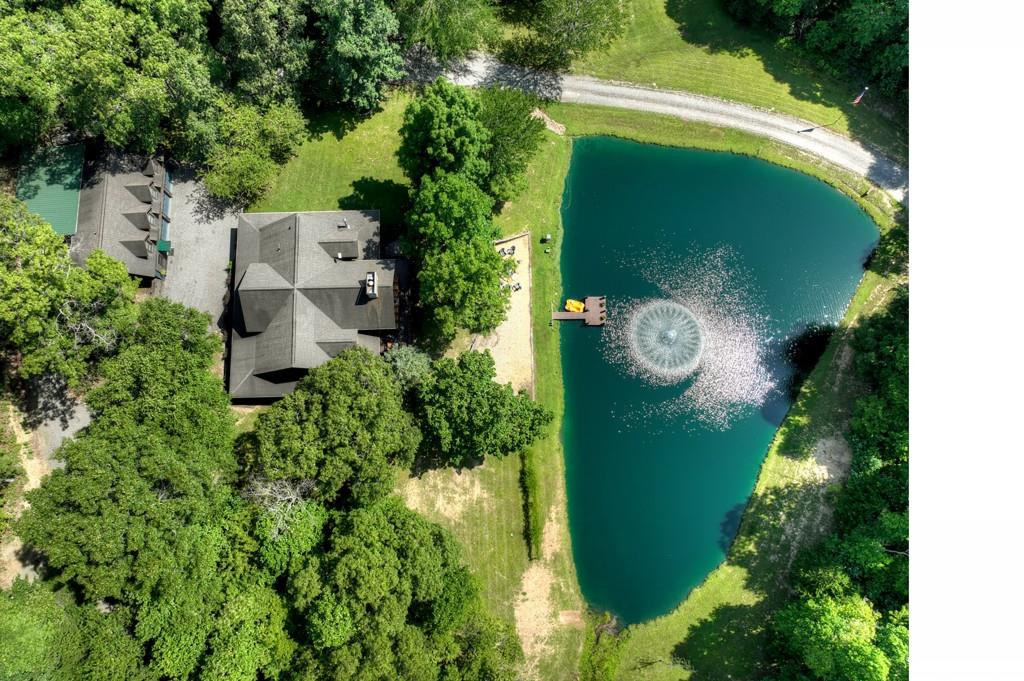 505 Old Salem Road Mineral Bluff, GA 30559 - Photo 72 of 88 an aerial view of a house with a yard and trees all around