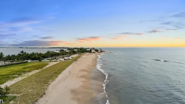 a view of a ocean with beach