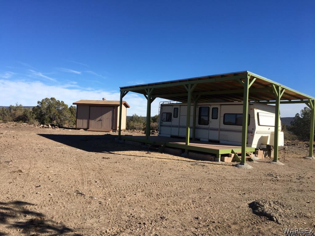 Lot 196 North Willows Ranch Road Kingman, AZ 86401 - Photo 1 of 9 a view of a house with backyard and sitting area
