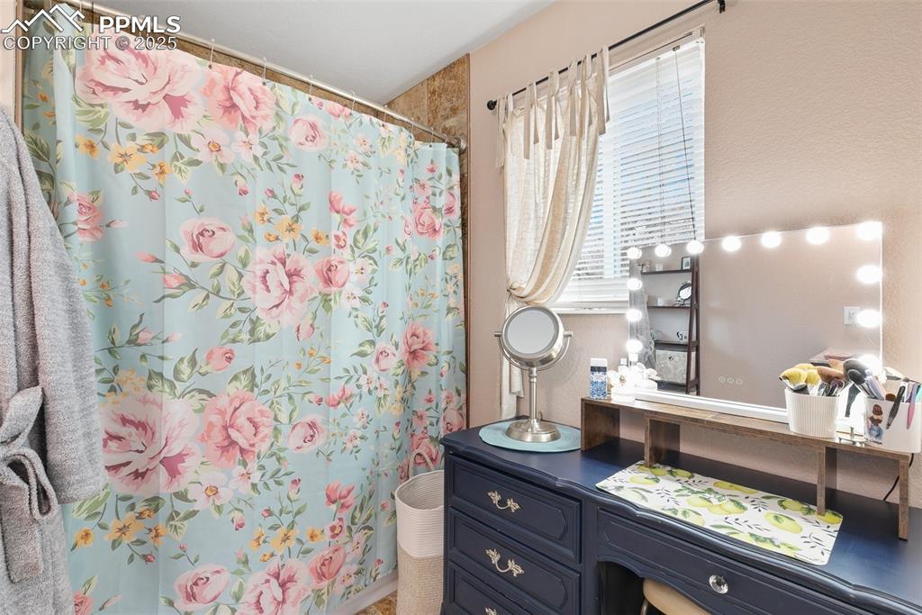 89 Security Boulevard Colorado Springs, CO 80911 - Photo 16 of 29 a view of a dresser next to a window
