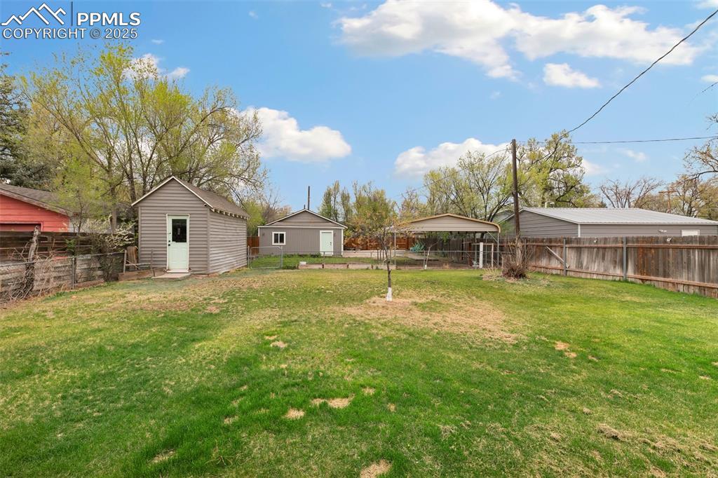 89 Security Boulevard Colorado Springs, CO 80911 - Photo 23 of 29 a house view with a garden space