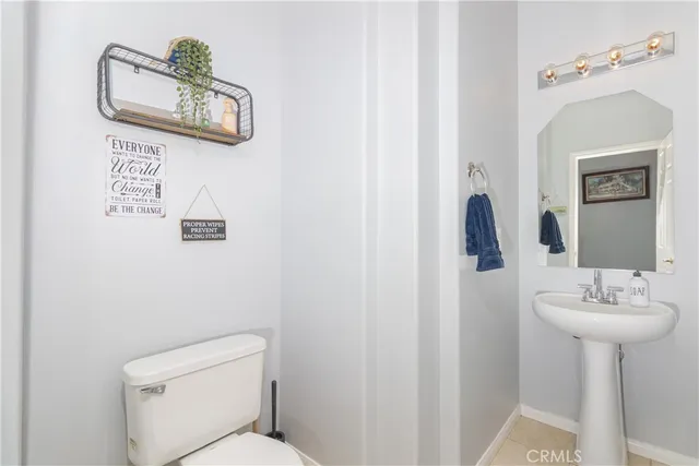 a view of a livingroom with furniture and a flat screen tv