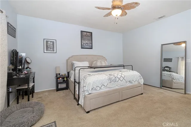 a white bath tub sitting in a bathroom next to a window