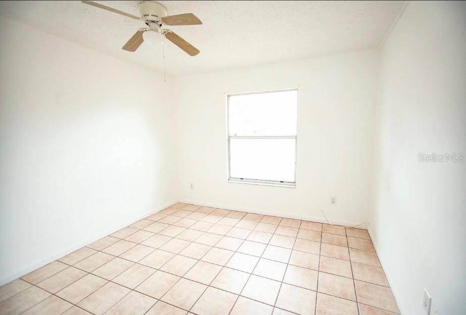 606 Water Road Ocala, FL 34472 - Photo 34 of 34 an empty room with windows