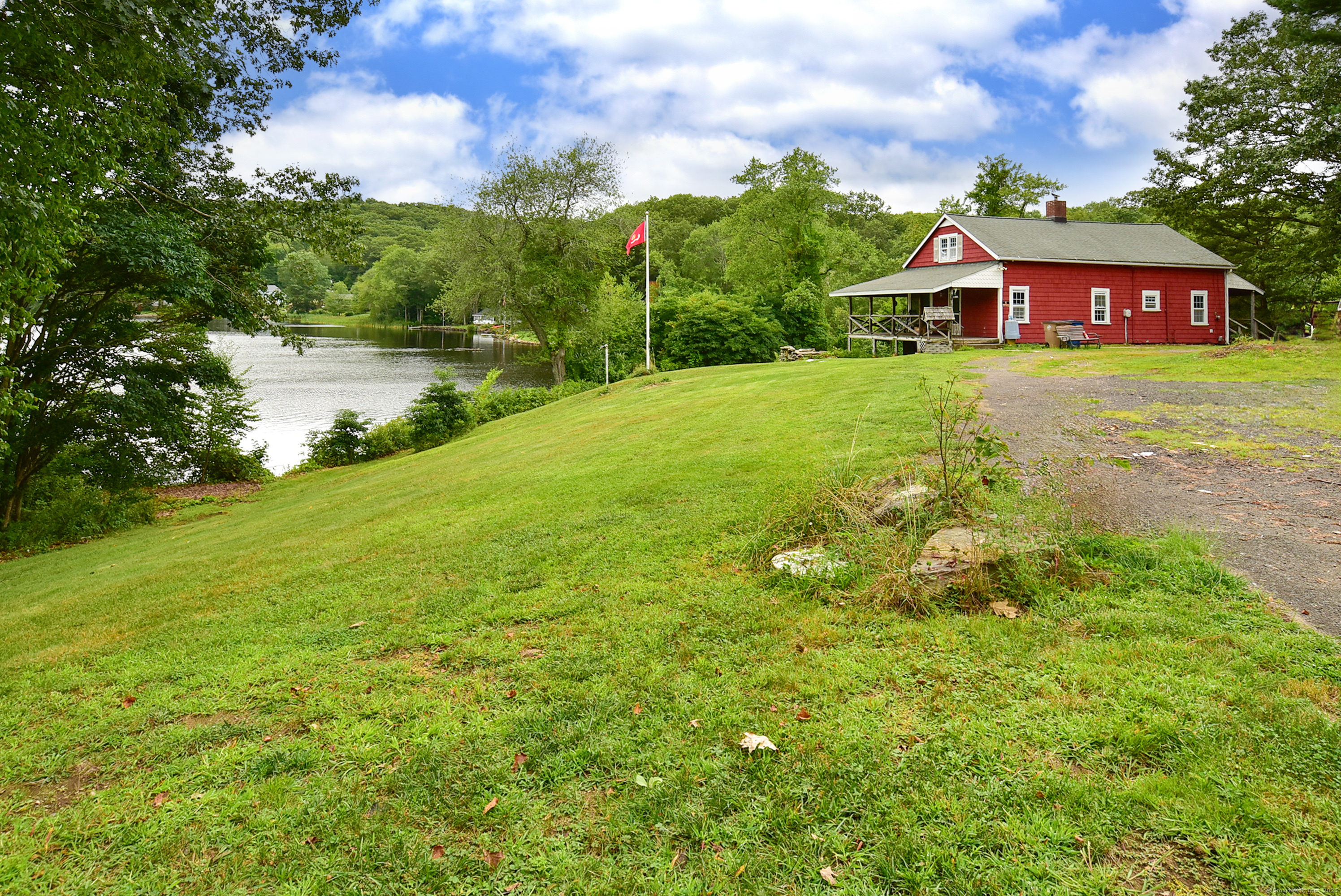 Undisclosed Address Vernon, CT 06066 - Photo 11 of 34 a view of a house with a yard