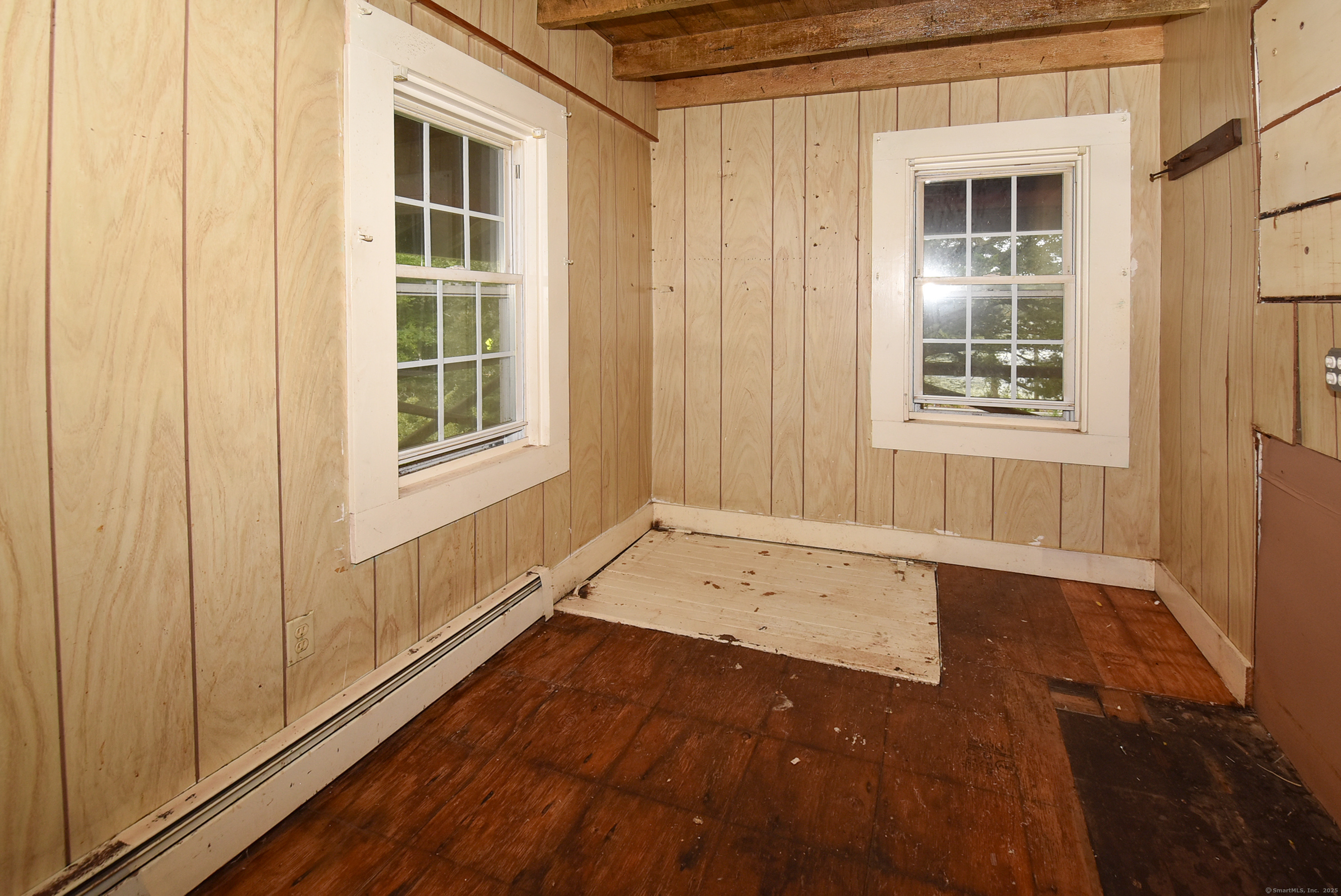Undisclosed Address Vernon, CT 06066 - Photo 26 of 34 an empty room with wooden floor and windows
