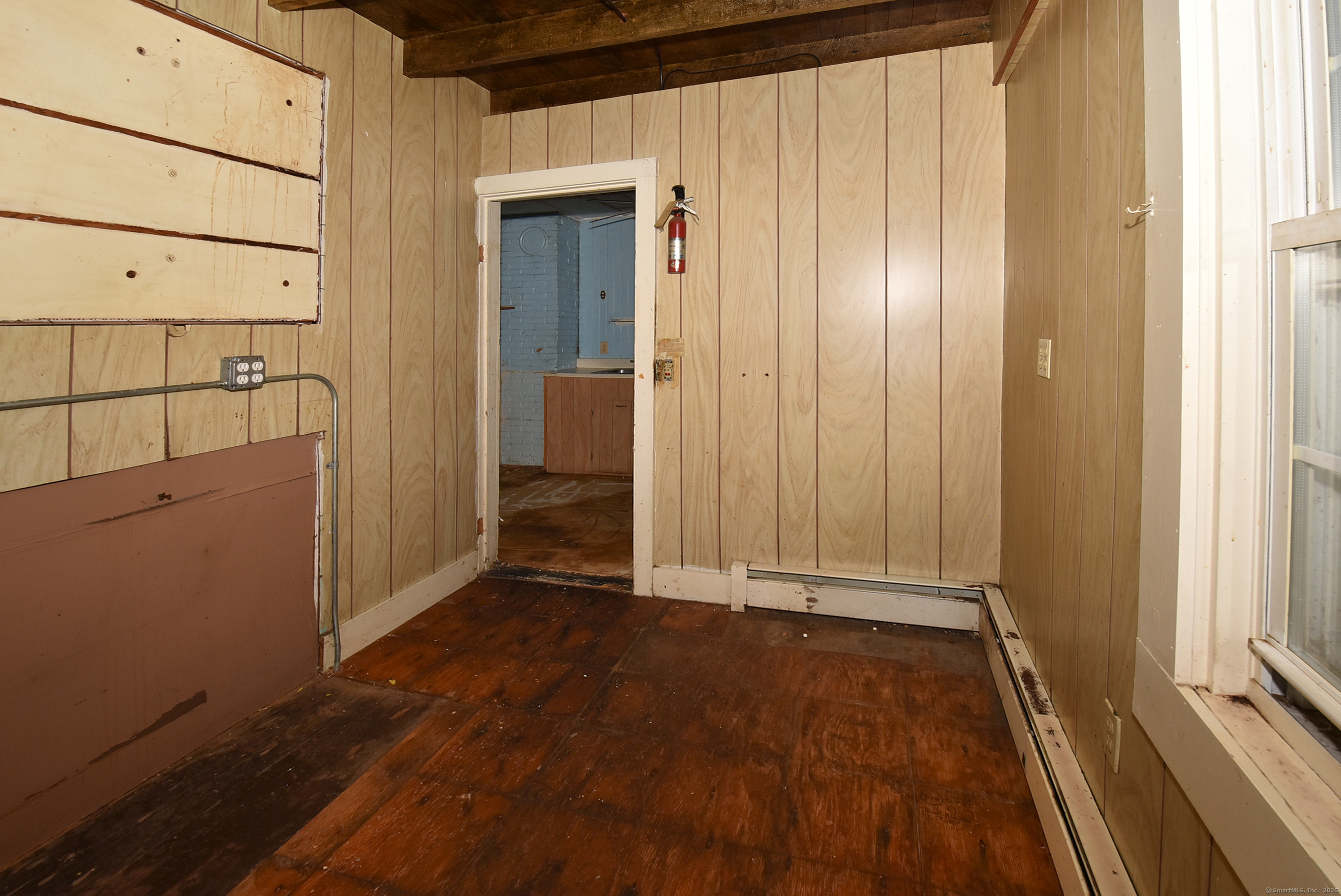 Undisclosed Address Vernon, CT 06066 - Photo 27 of 34 an empty room with wooden floor and windows