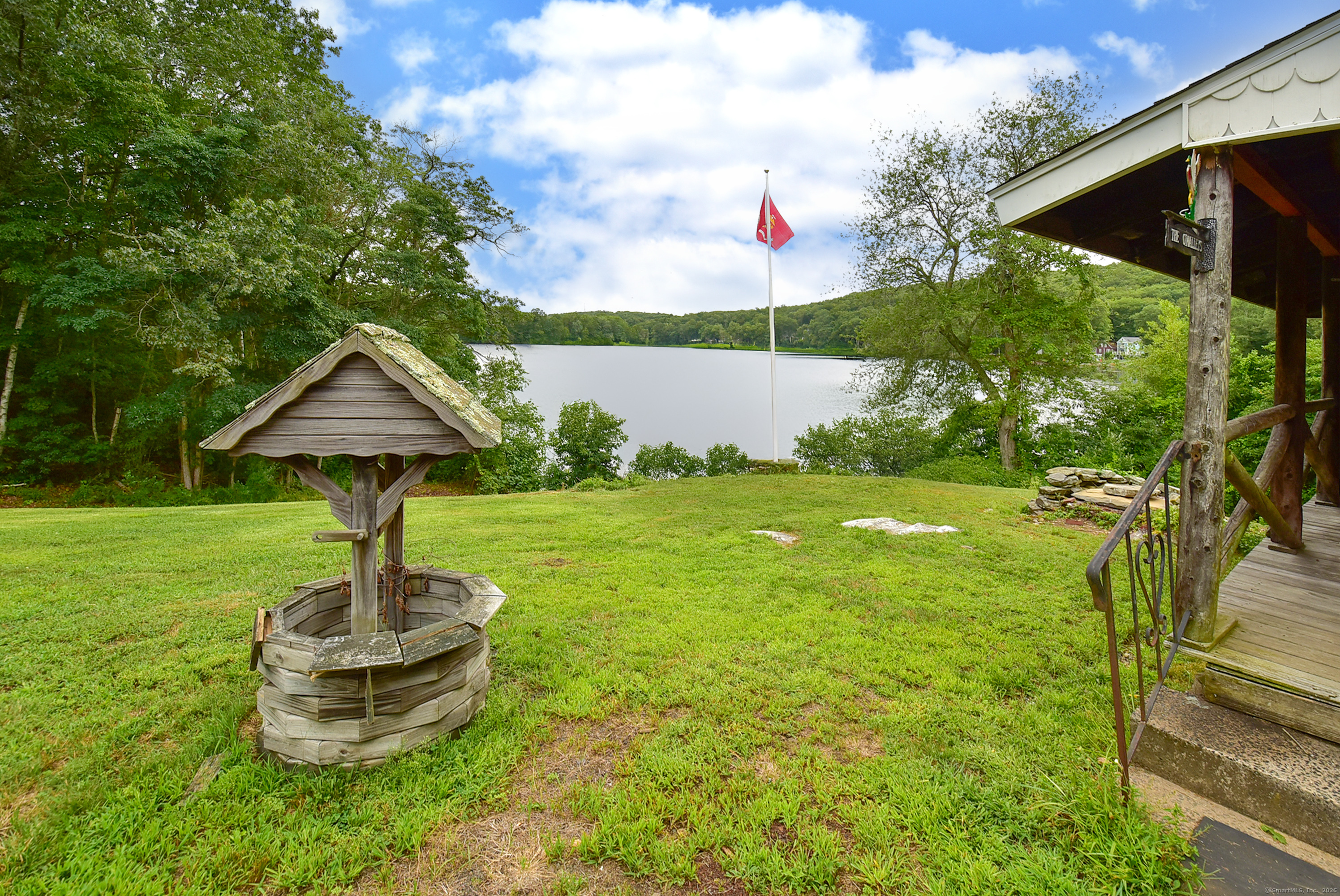 Undisclosed Address Vernon, CT 06066 - Photo 33 of 34 a front view of a house with garden