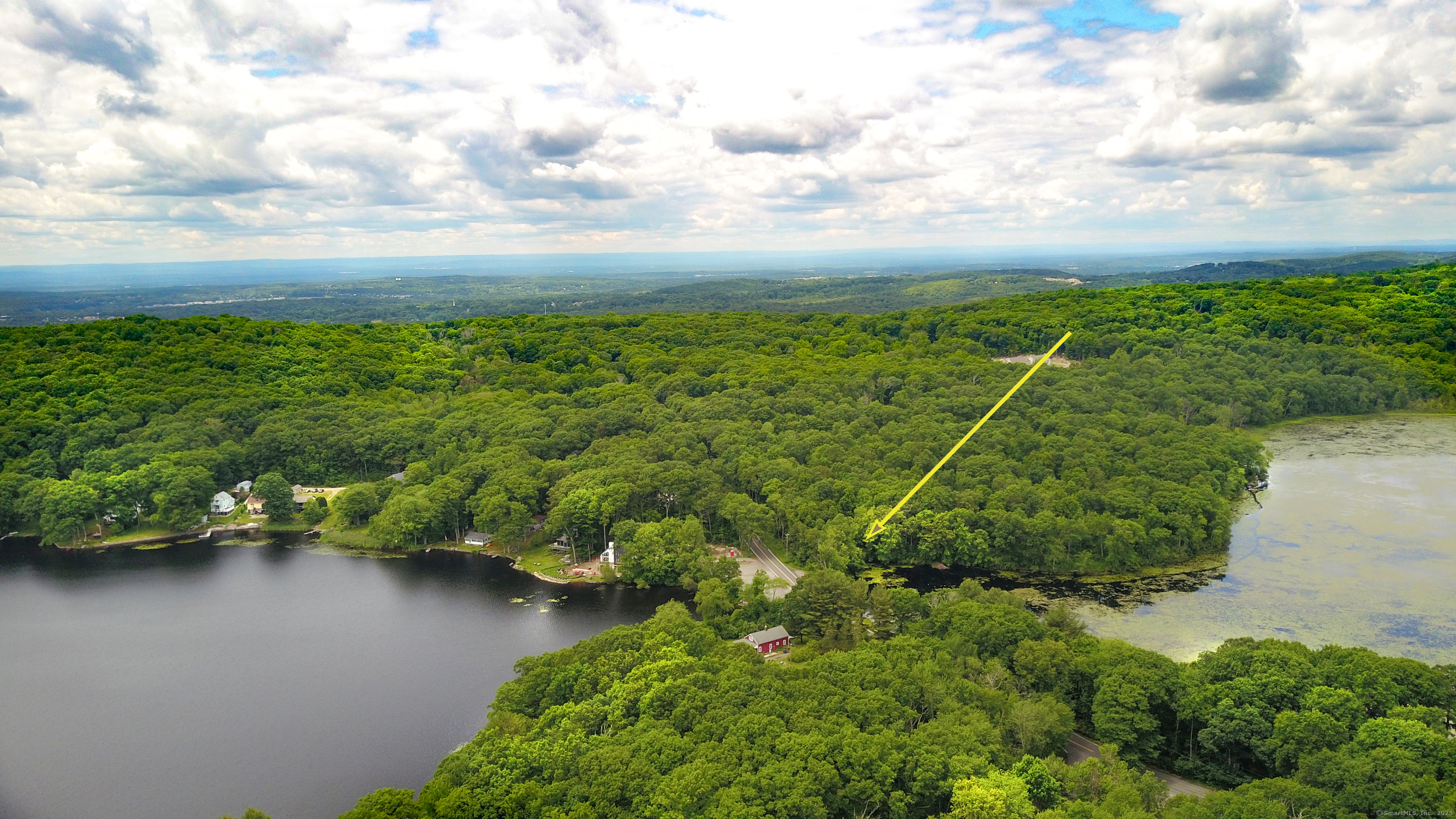 Undisclosed Address Vernon, CT 06066 - Photo 4 of 34 a view of a lake with a houses