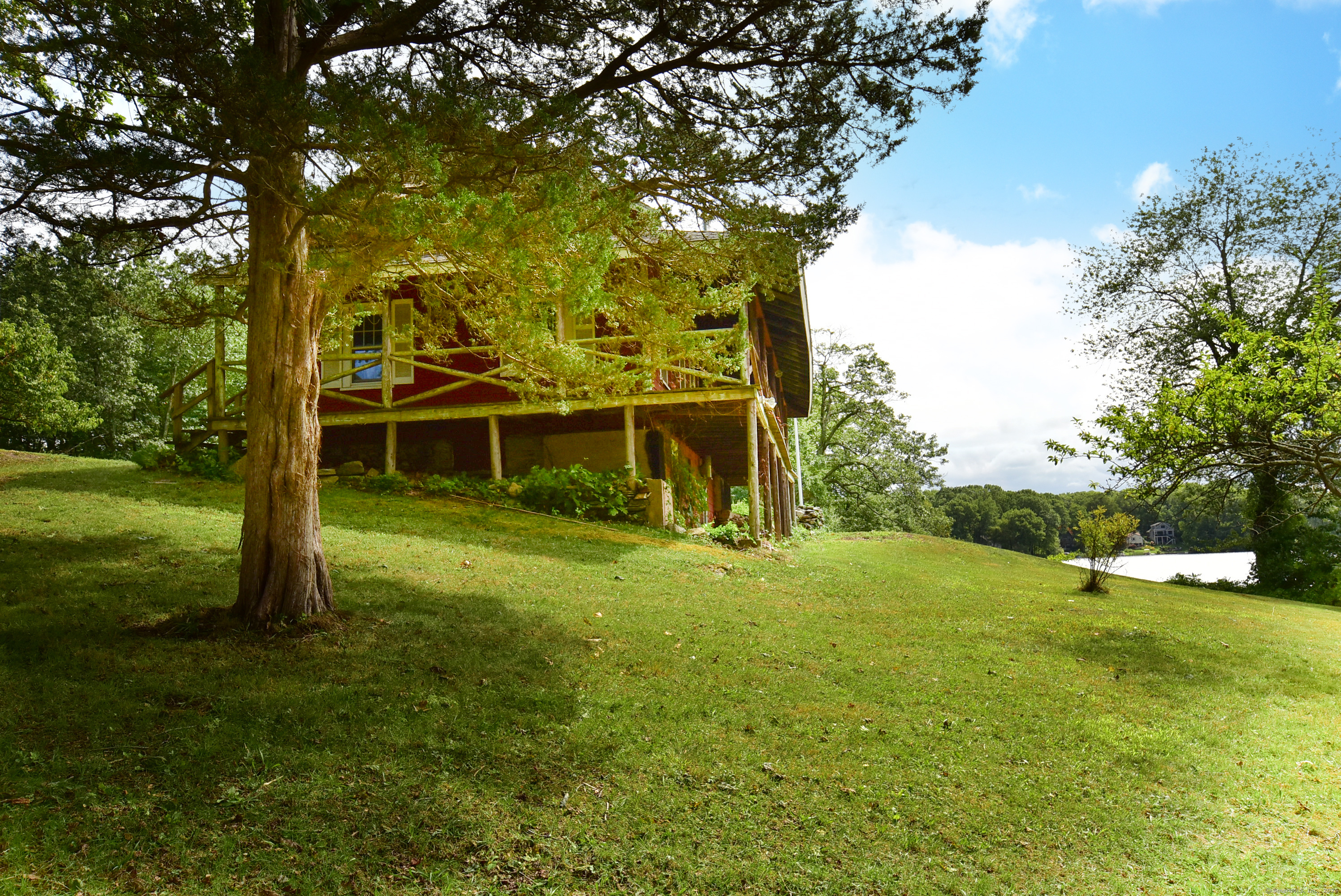 Undisclosed Address Vernon, CT 06066 - Photo 9 of 34 a view of a house with a yard
