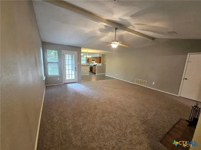 a view of a livingroom with a fireplace