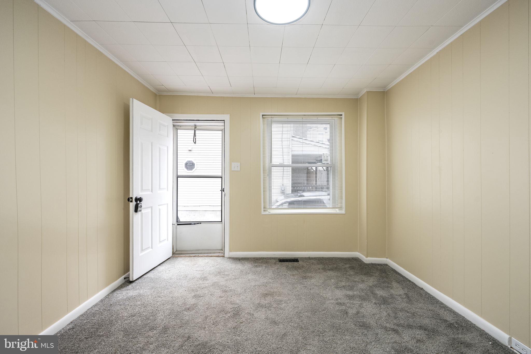 207 Kline Street Reading, PA 19611 - Photo 2 of 24 an empty room with windows