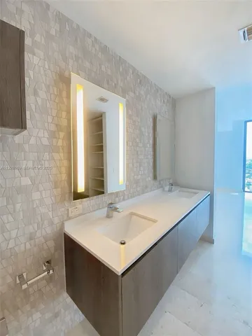 a front view of a building with glass windows