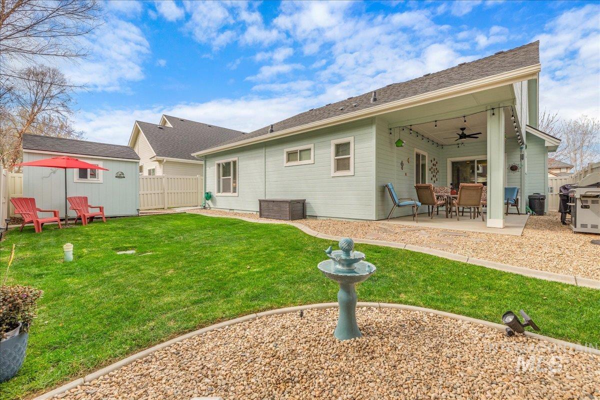 3038 North Christian Way Meridian, ID 83646 - Photo 35 of 48 Back of property with a patio and a ceiling fan