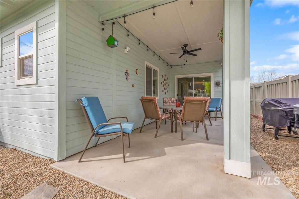 3038 North Christian Way Meridian, ID 83646 - Photo 36 of 48 View of patio / terrace featuring outdoor dining space, ceiling fan, and grilling area