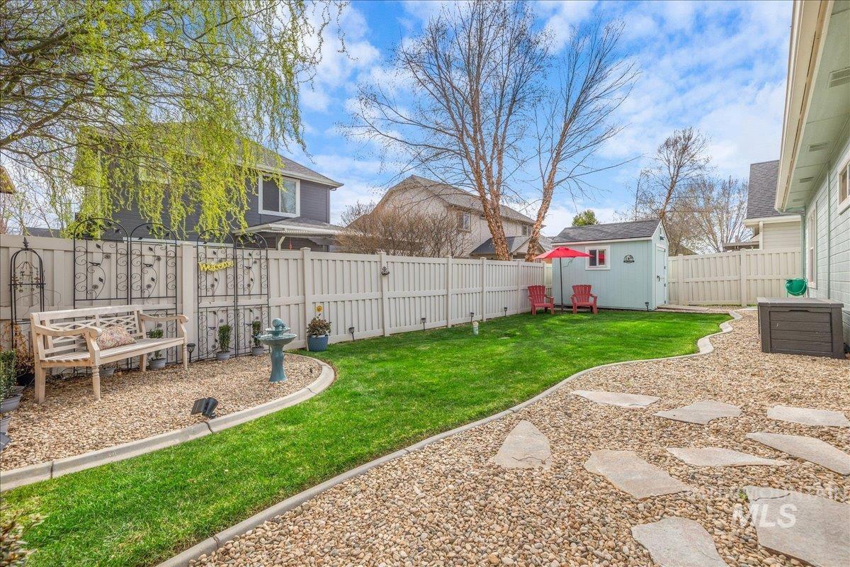 3038 North Christian Way Meridian, ID 83646 - Photo 37 of 48 Fenced backyard featuring a storage unit