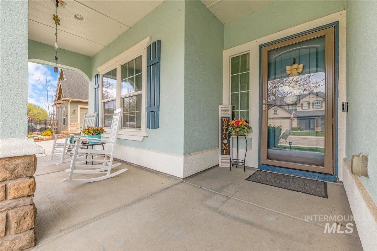 3038 North Christian Way Meridian, ID 83646 - Photo 4 of 48 Property entrance featuring covered porch and stucco siding