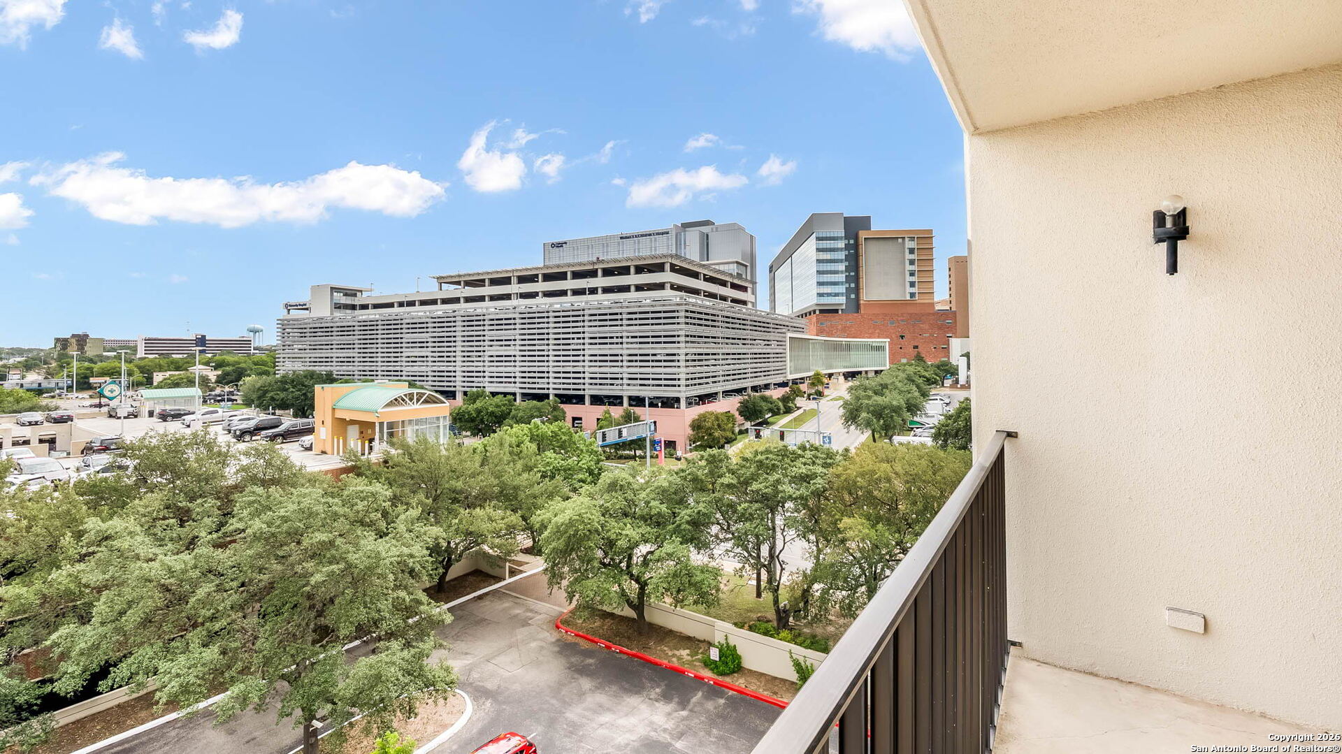 7701 Wurzbach Road, Unit 606 San Antonio, TX 78229 - Photo 10 of 10 a view of a balcony with an outdoor space