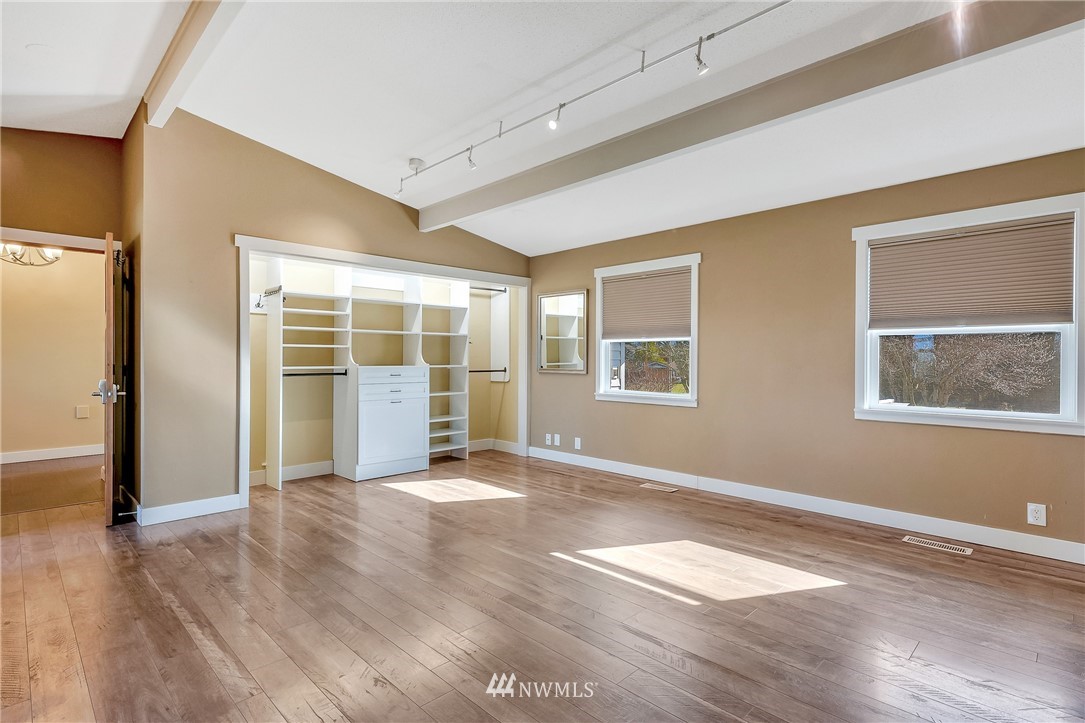 5874 Laurel Ridge Way Bellingham, WA 98226 - Photo 19 of 40 a view of an empty room with wooden floor and a window