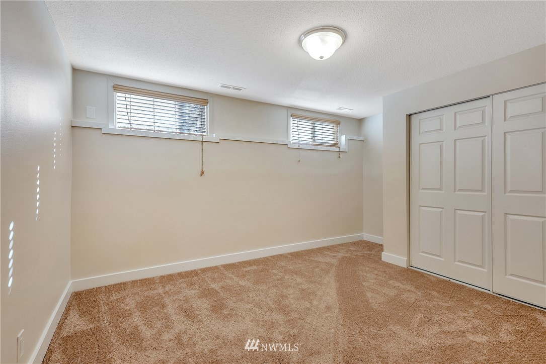 5874 Laurel Ridge Way Bellingham, WA 98226 - Photo 25 of 40 an empty room with windows